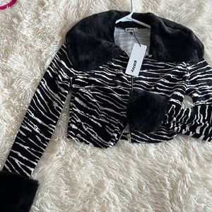 Zebra fur cuffed sweater